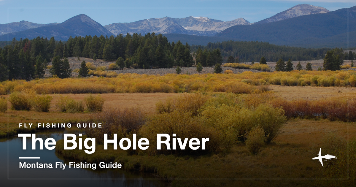The Big Hole River winding through a fall meadow in southwest Montana, snow on the Pintler peaks behind